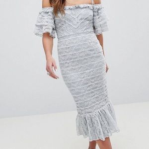 Lace pencil midi dress with ruffle